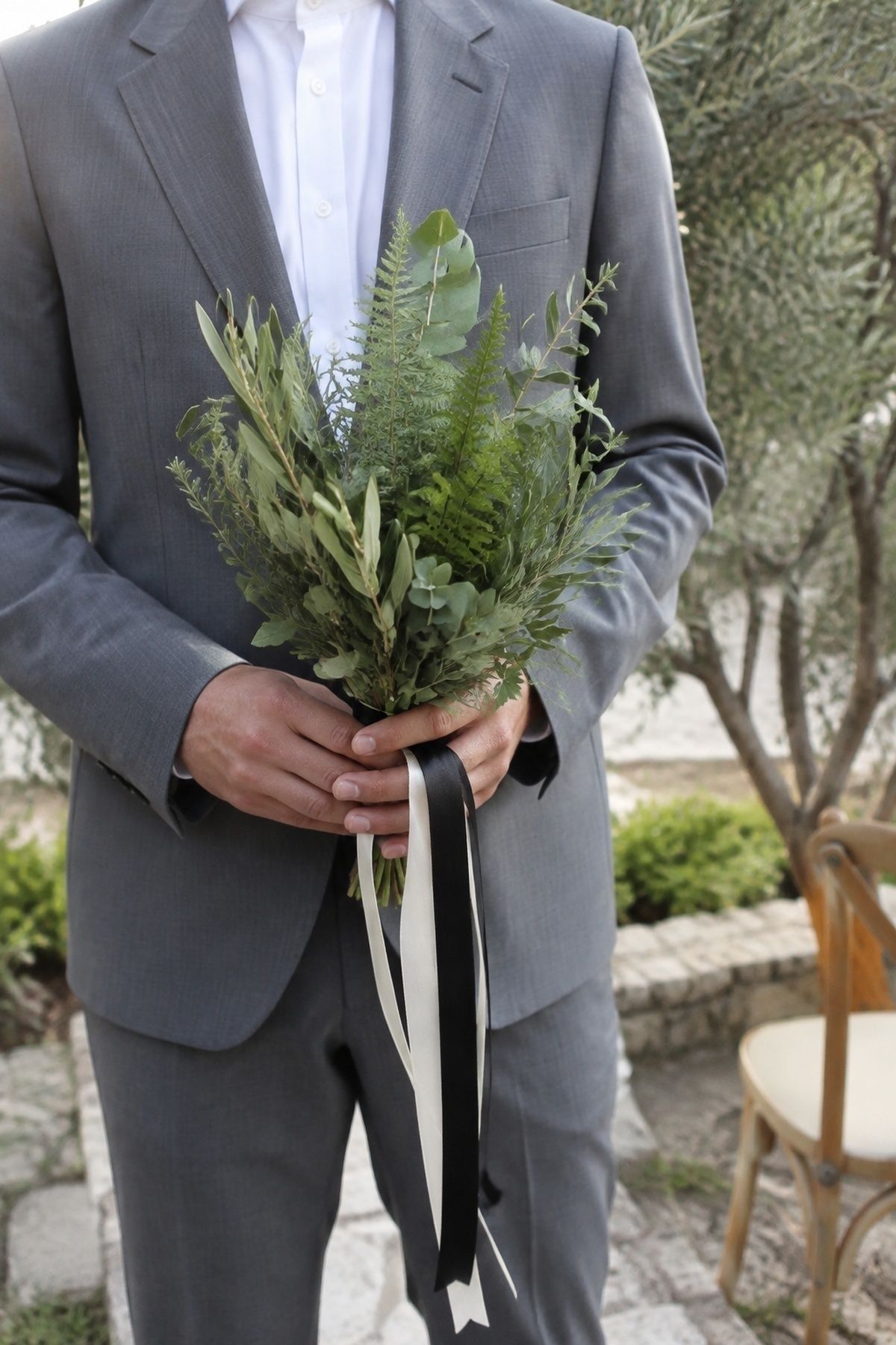 Minimal greenery bouquet tied with ribbon
