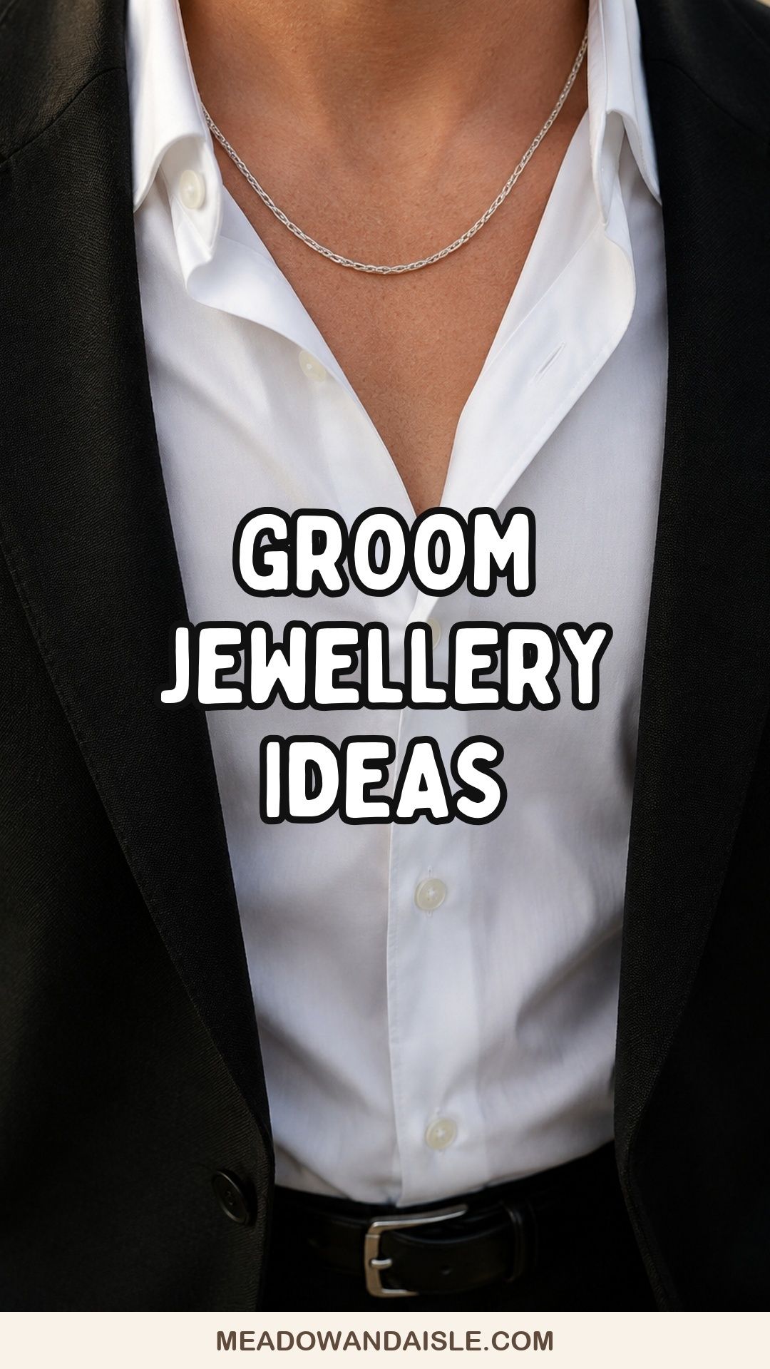 Groom jewellery ideas with a silver chain and open-collar black suit
