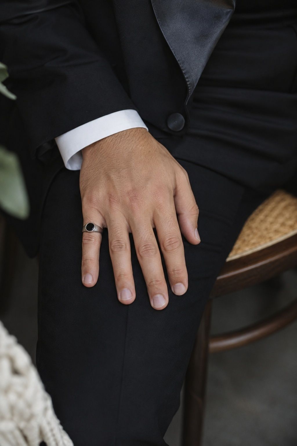 Pinky ring worn with a classic tuxedo