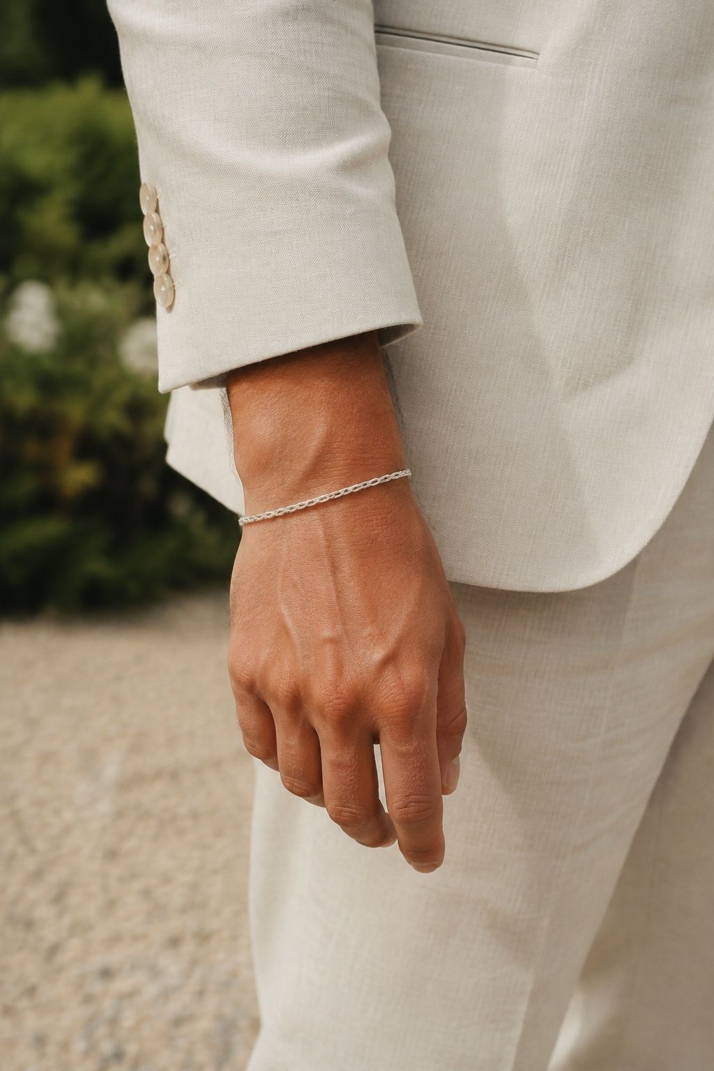 Hand bracelet with a linen wedding suit