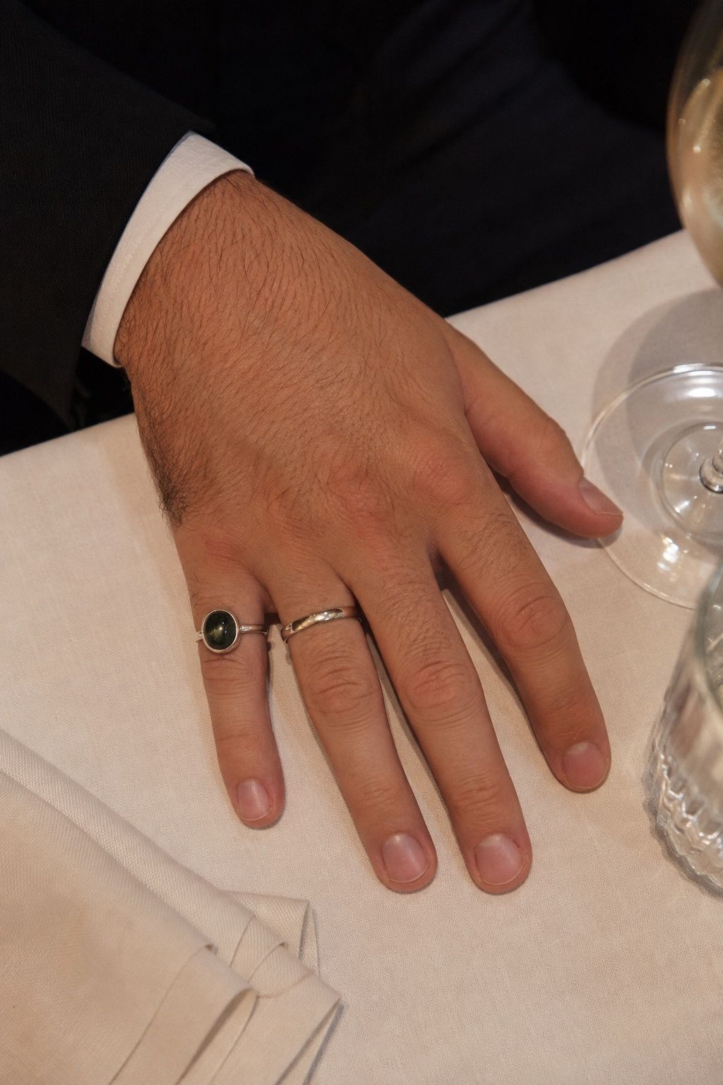 Statement ring stacked with a wedding band