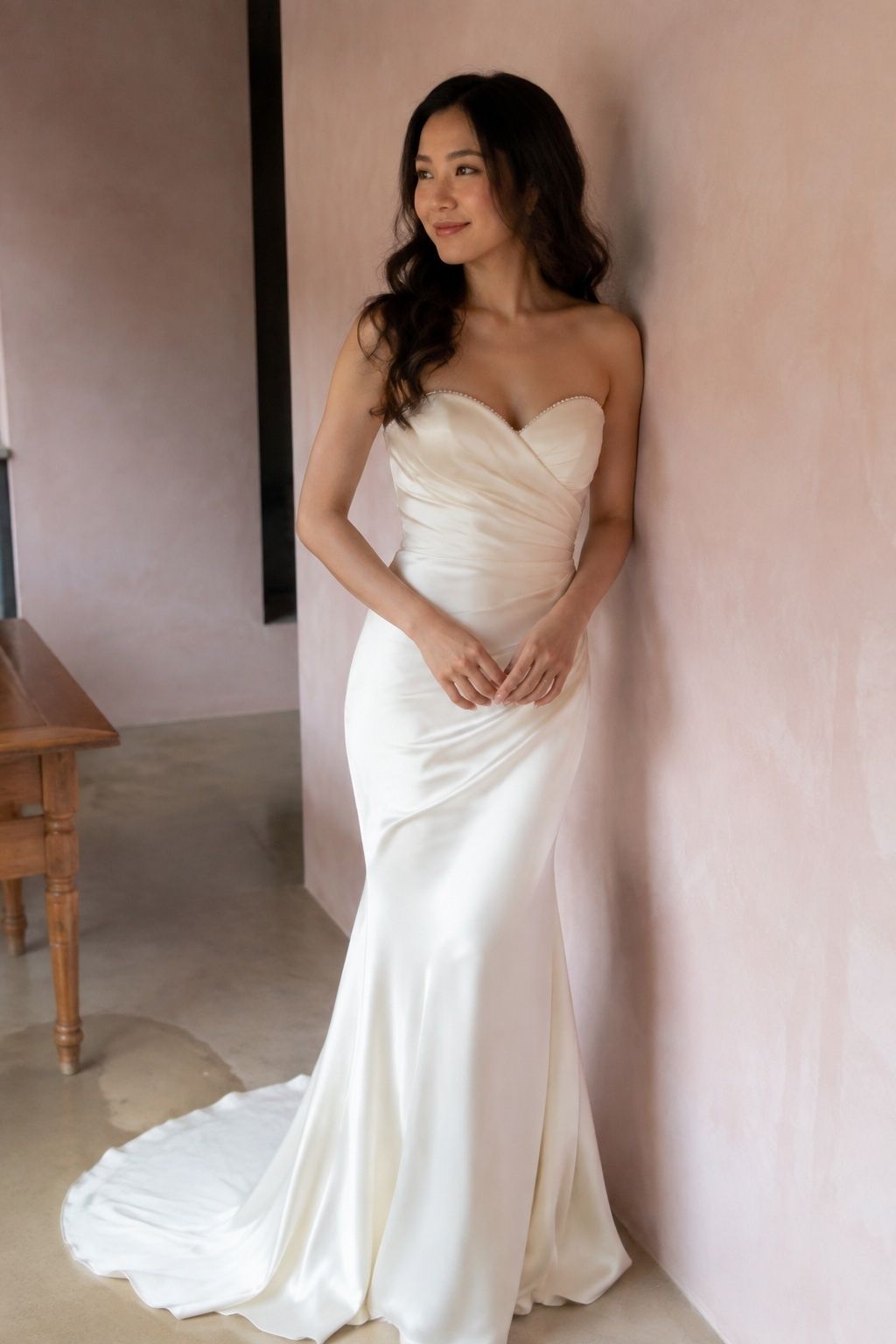 Light pearl accents at neckline, strongest fabric folds left unobscured.