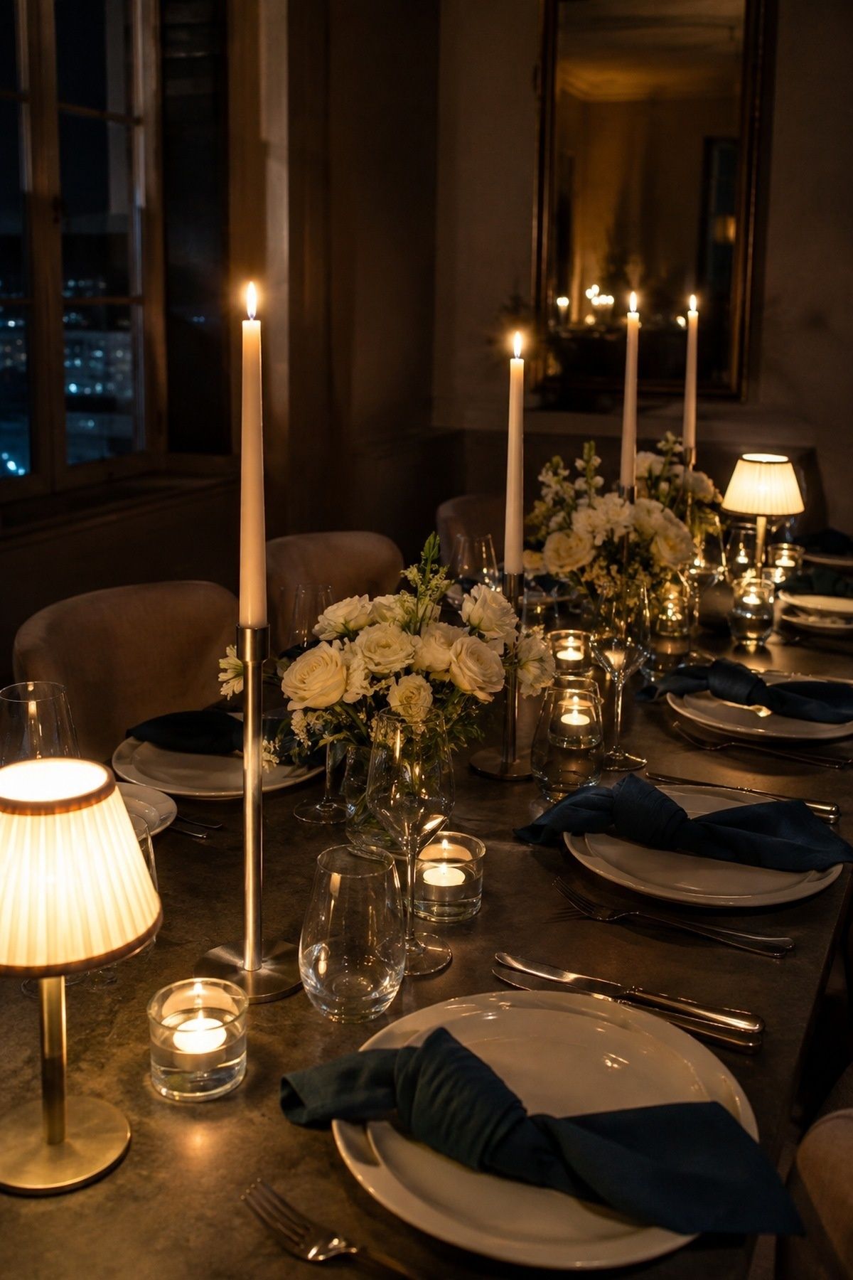 Candlelight warming a midnight teal palette