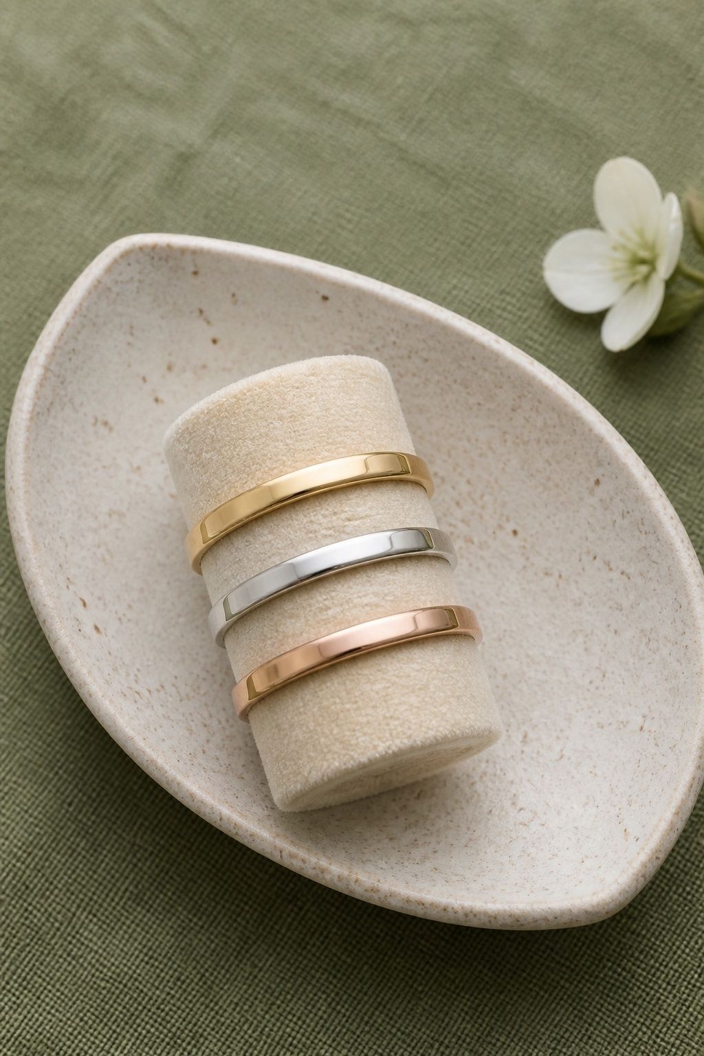 Three-metal ring stack in one shared width