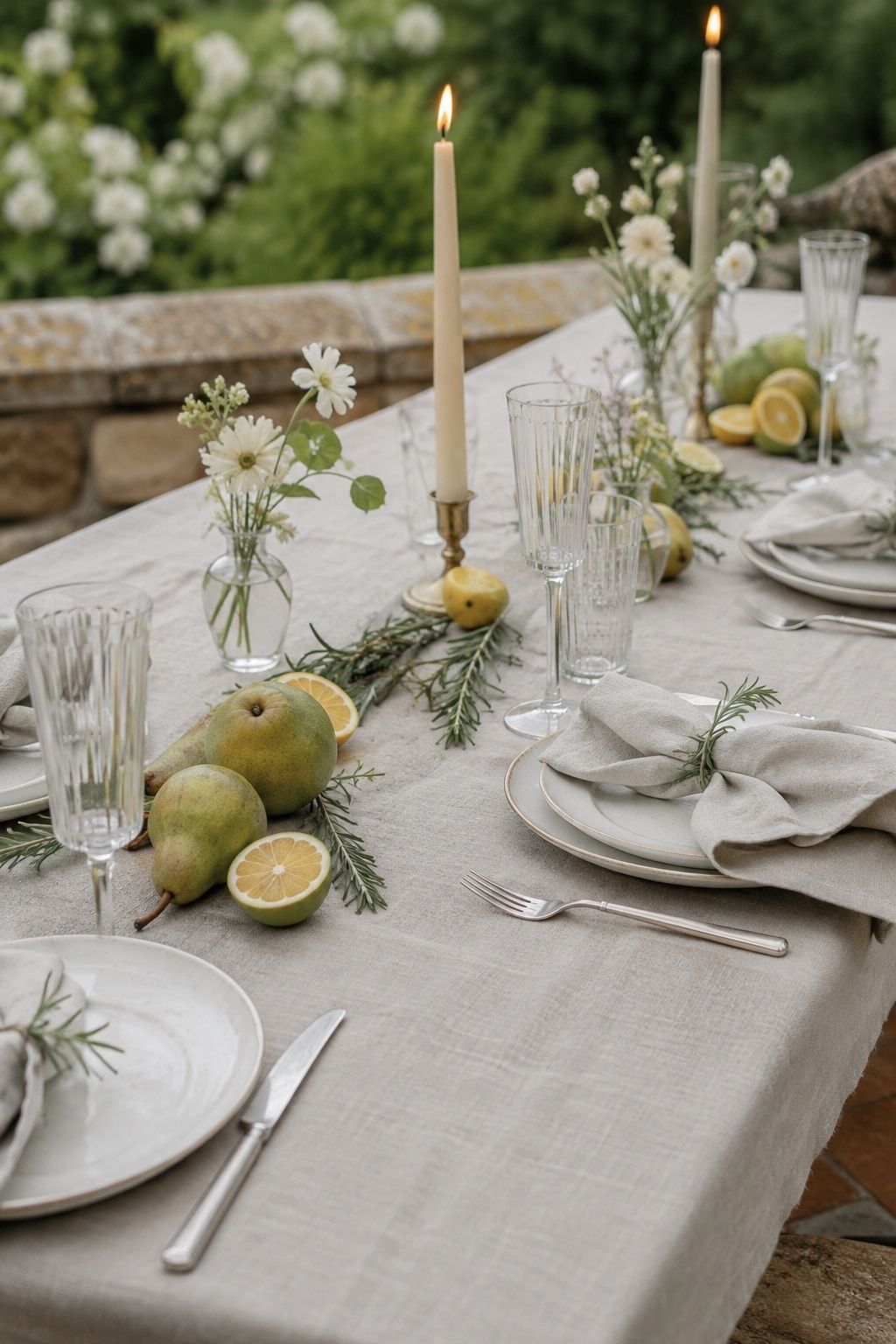 Pears, citrus and rosemary add restrained spring texture to a wedding table.