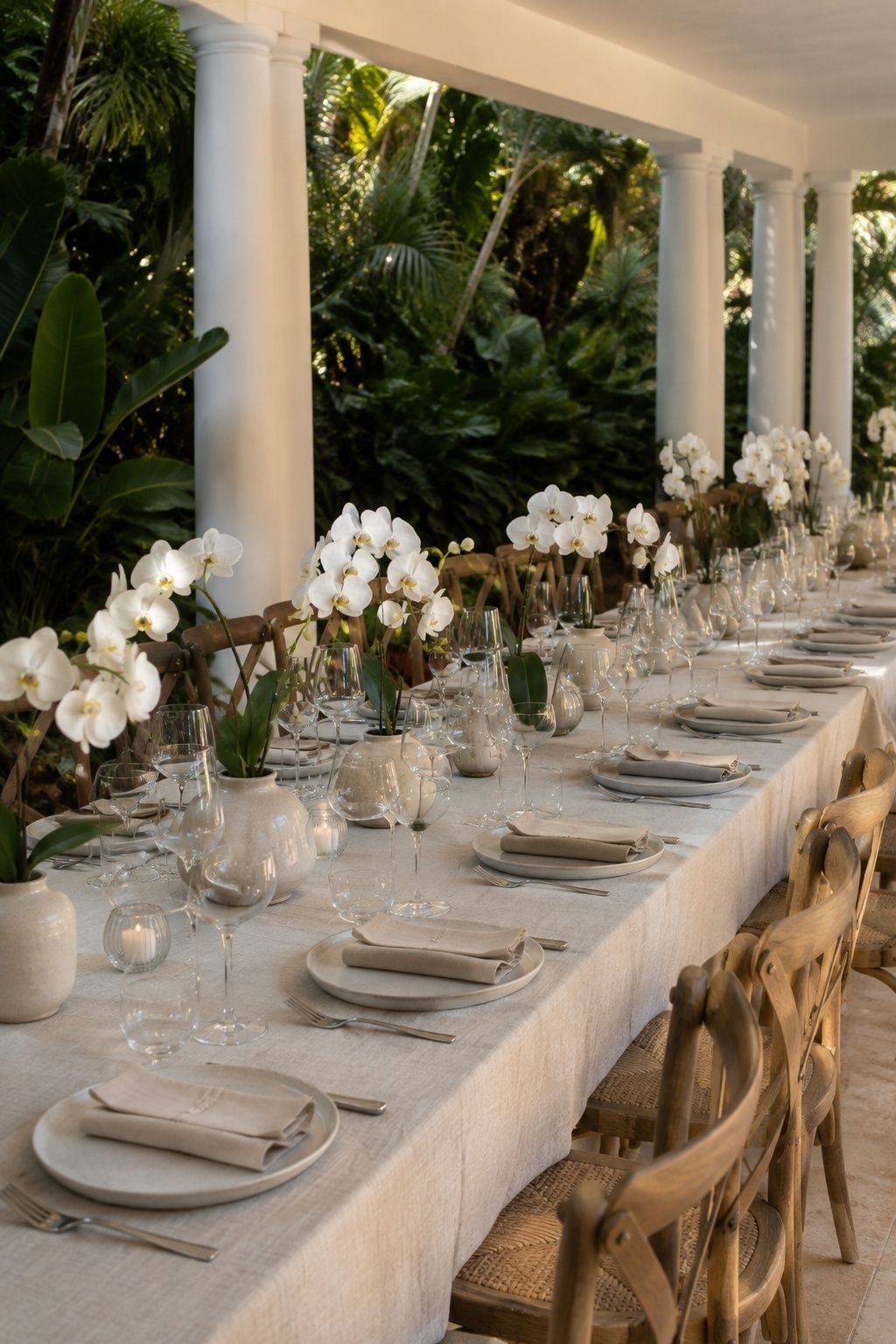 White orchids on warm neutral linens