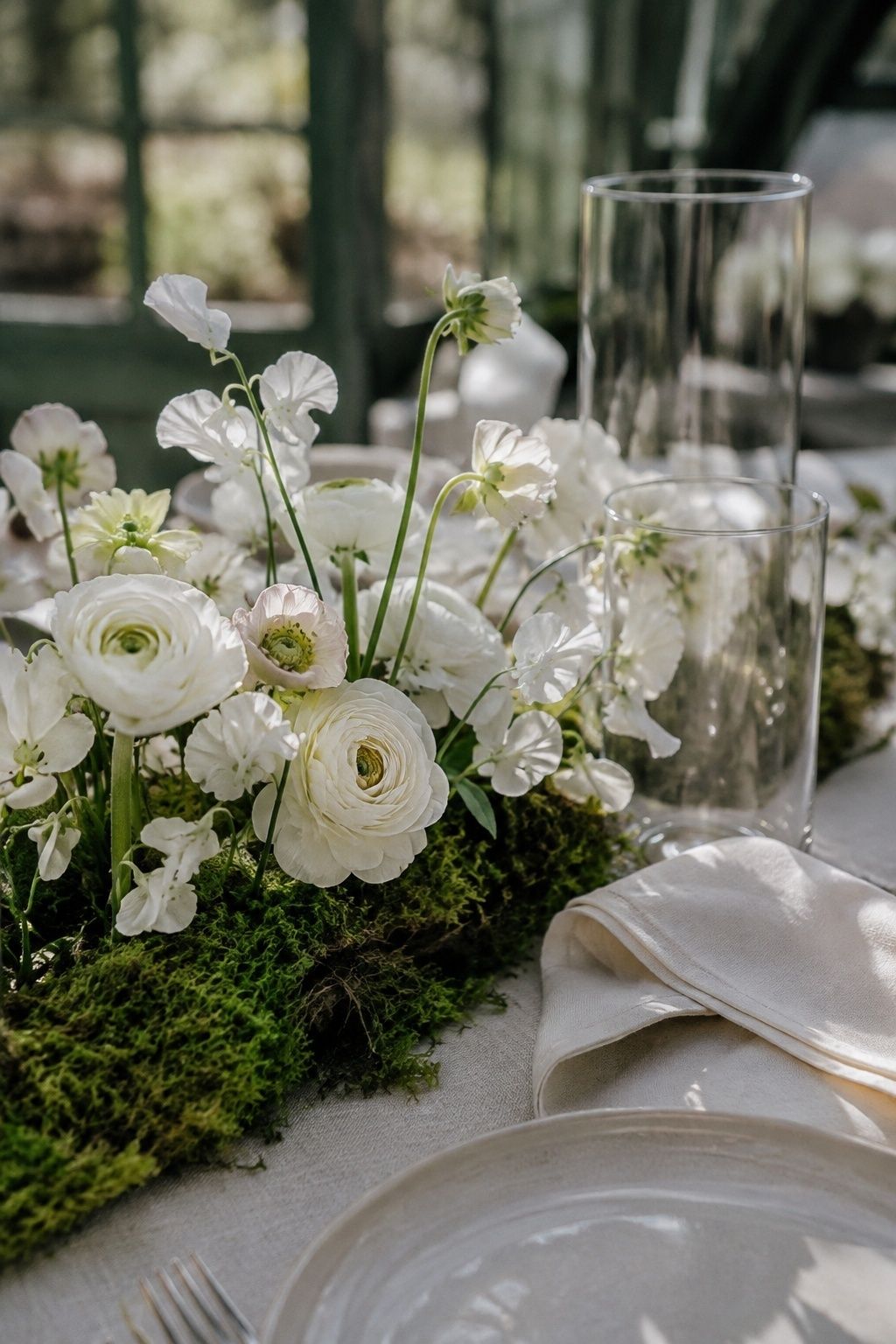 Moss paired with white flowers