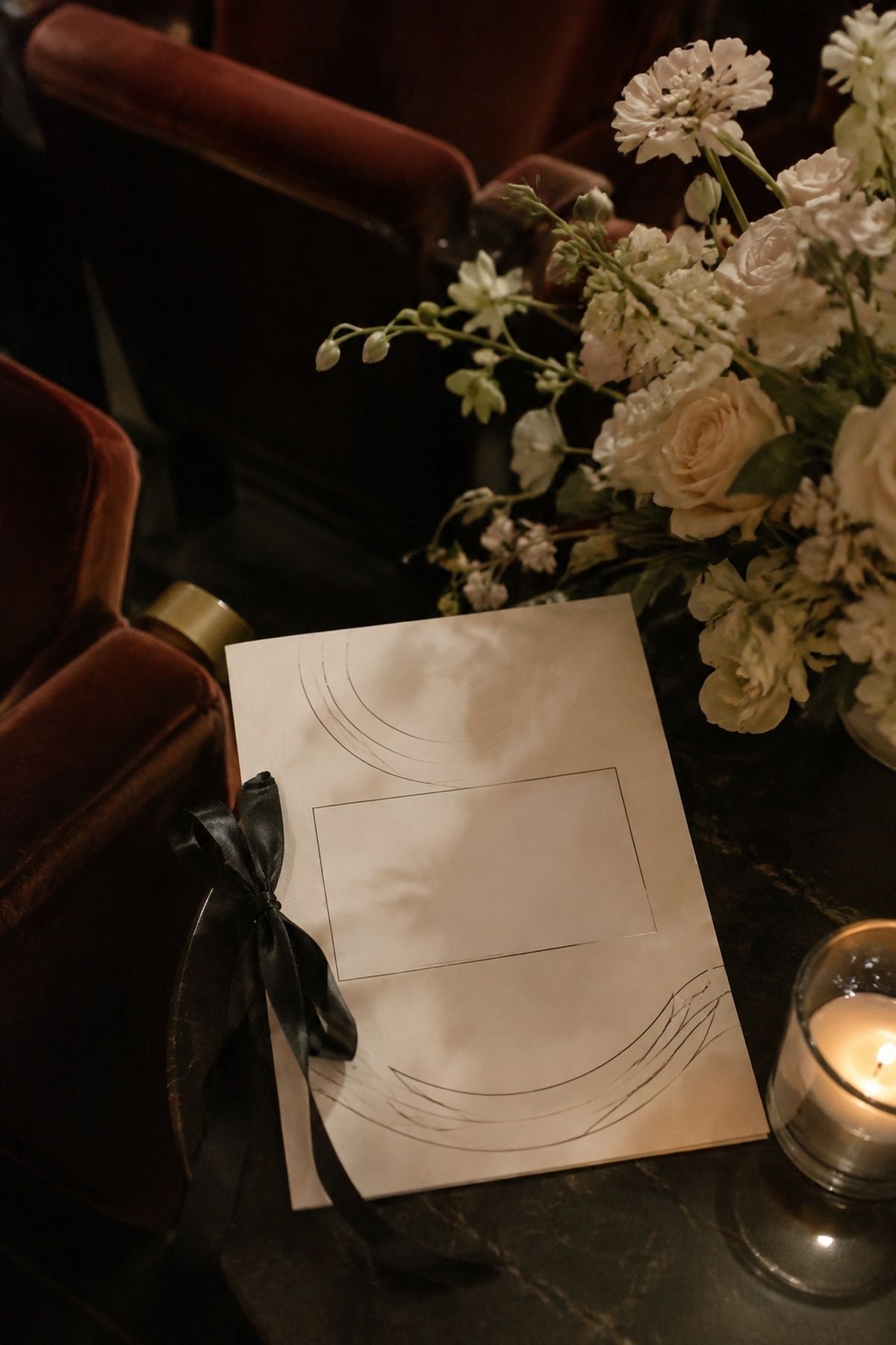 Quiet film quote detail in a cinema wedding program