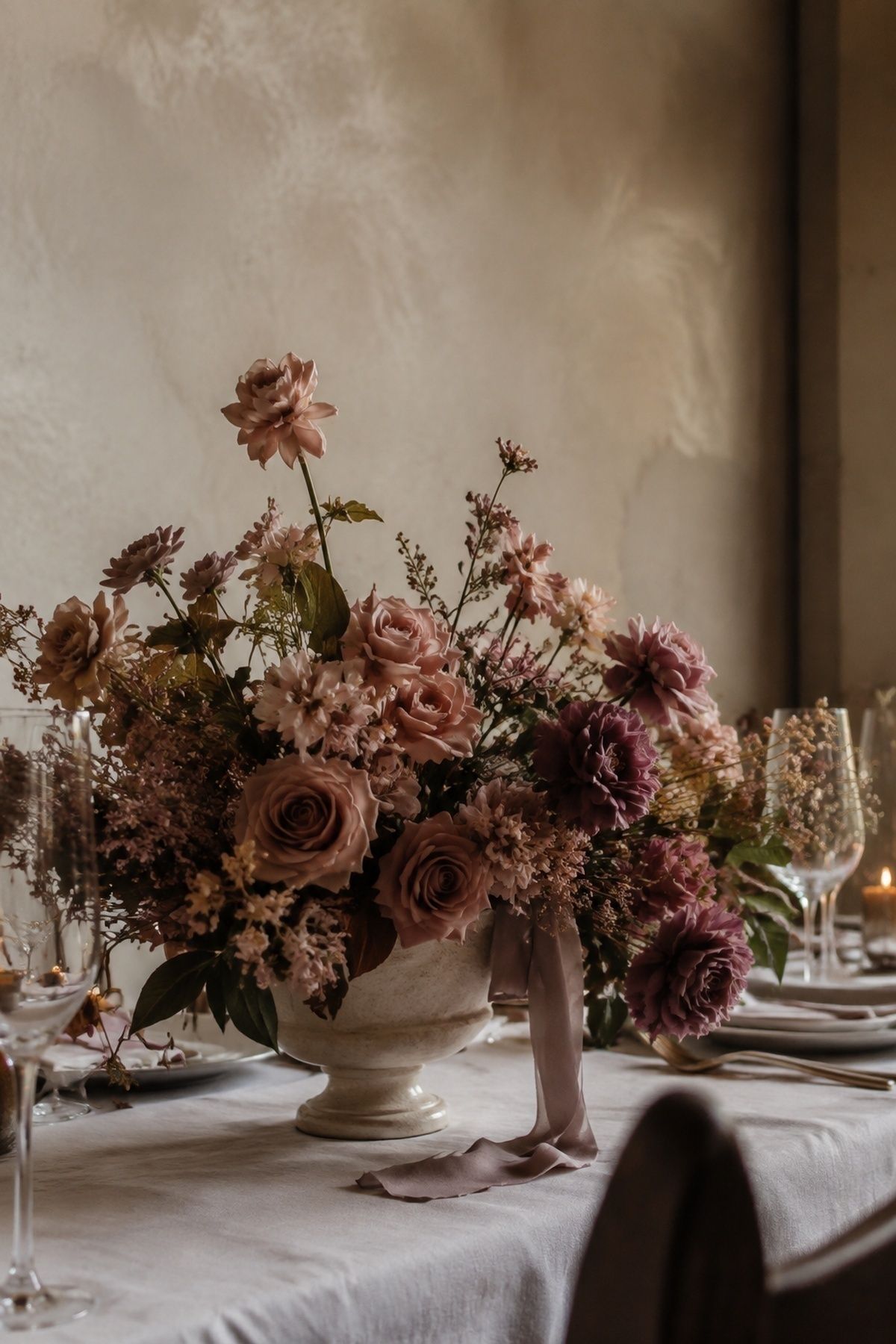 Mauve flowers adding depth to muted rose decor