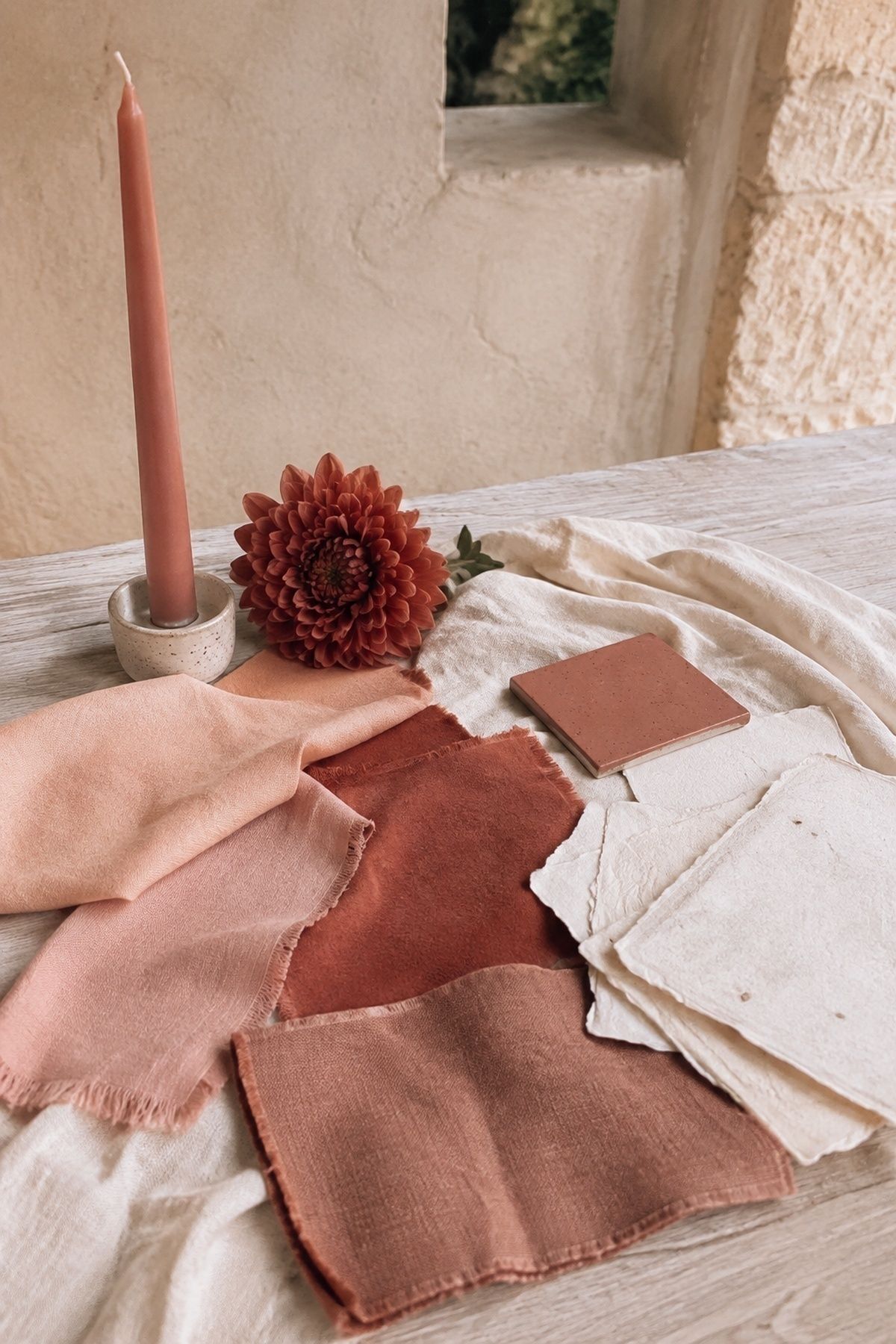 Soft muted terracotta rather than bright orange