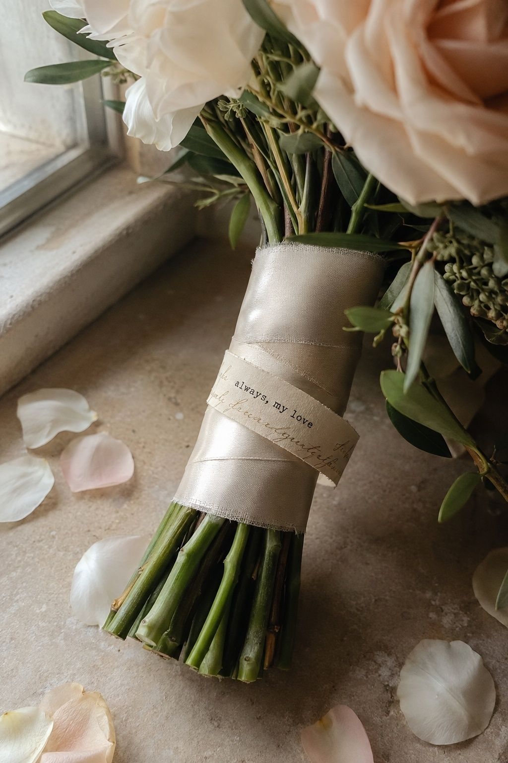 Song lyrics wrapped around bouquet stems