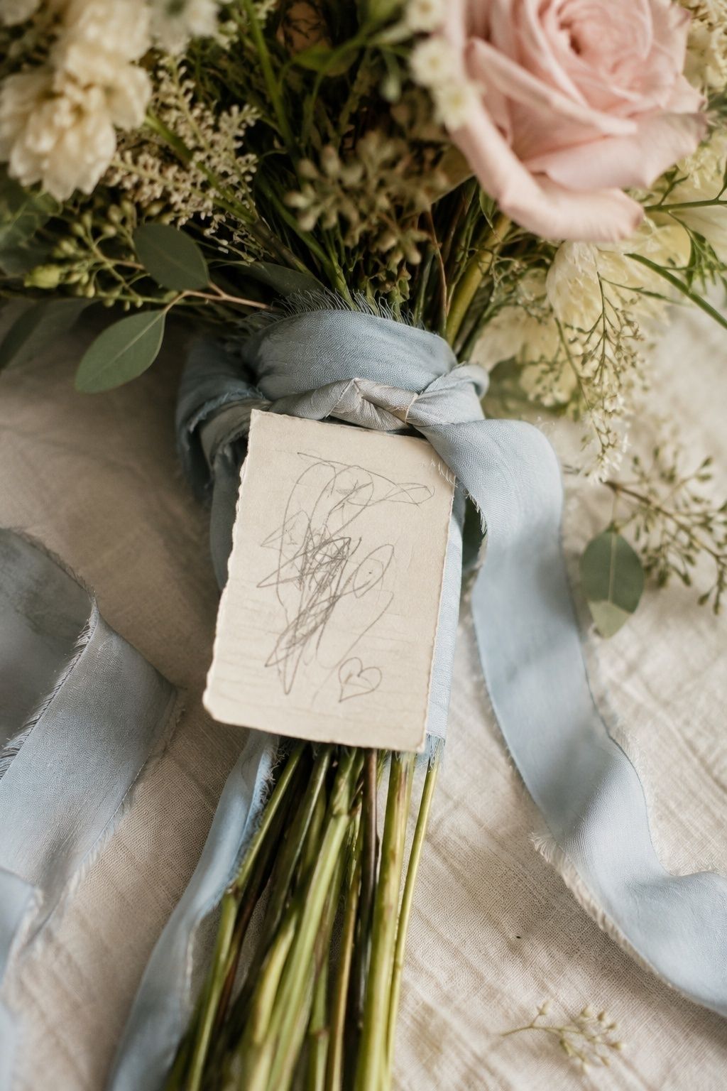 Childhood handwriting added to a bouquet