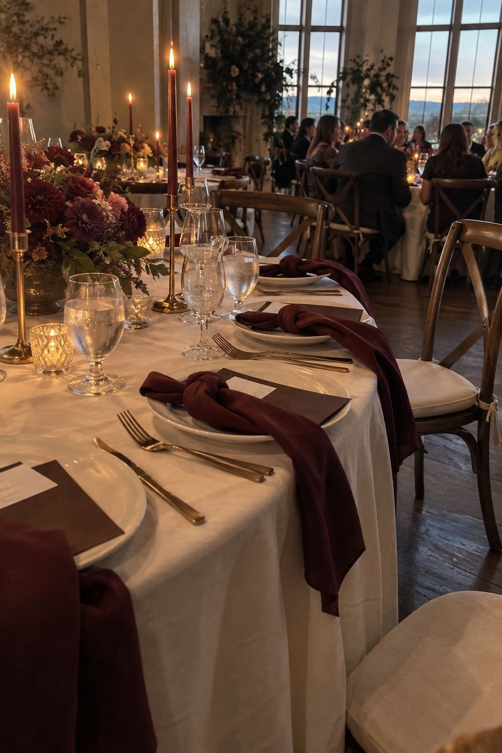 Burgundy, plum, copper, chocolate, and ivory November wedding table palette.