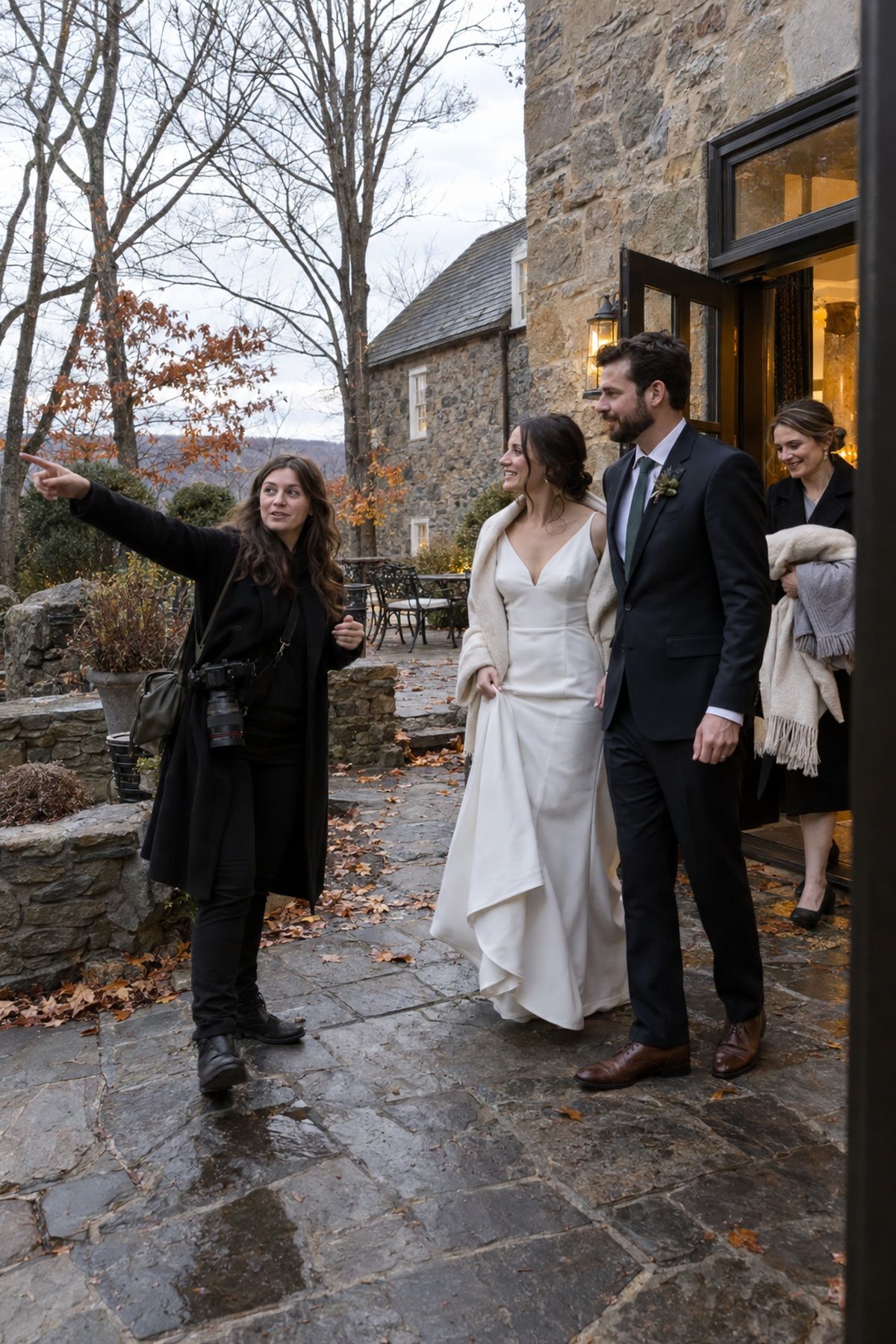 A photographer leads newlyweds outside for November portraits before the daylight fades.