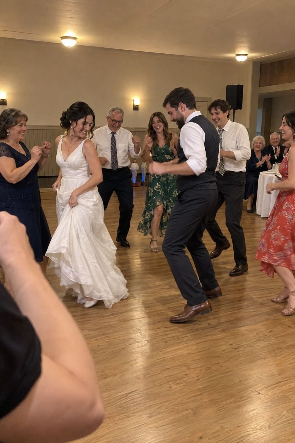 Newlyweds and guests enjoy one lively short dance set after dinner.