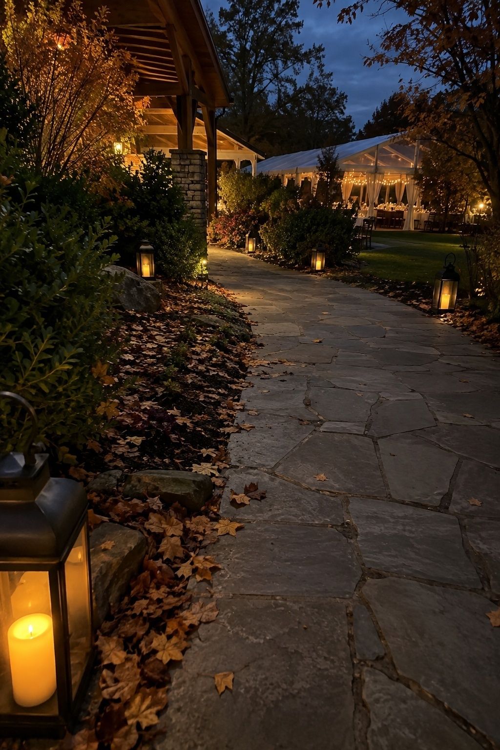 Safe lantern-lit path leading guests to an October wedding dinner