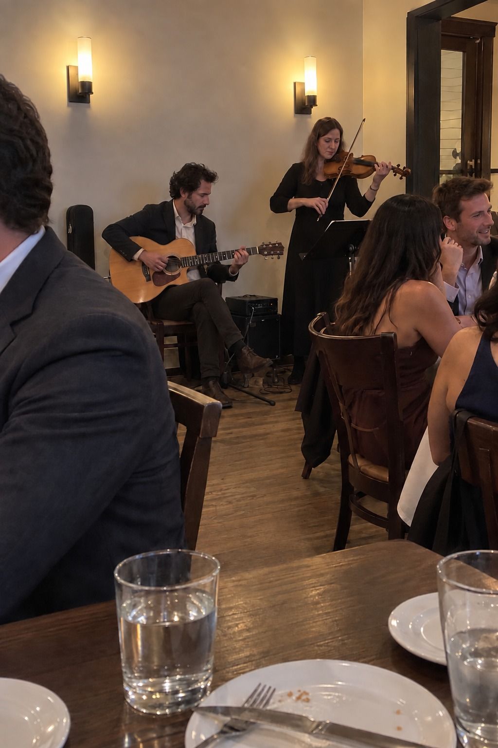 An acoustic duo adds atmosphere without overwhelming dinner conversation.