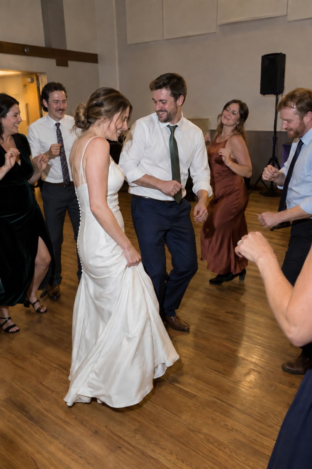 A small group joins an easy dance set after dessert.