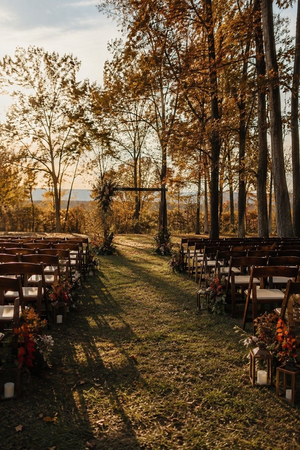 Outdoor fall ceremony arranged in golden-hour light before sunset