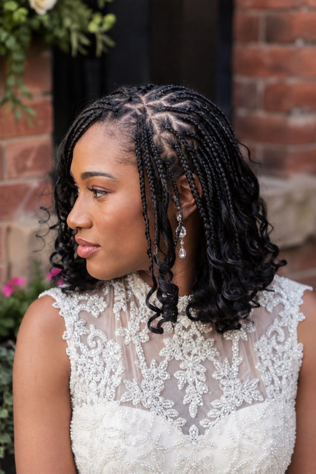 Bride wearing loose shoulder-length pick and drop curls.