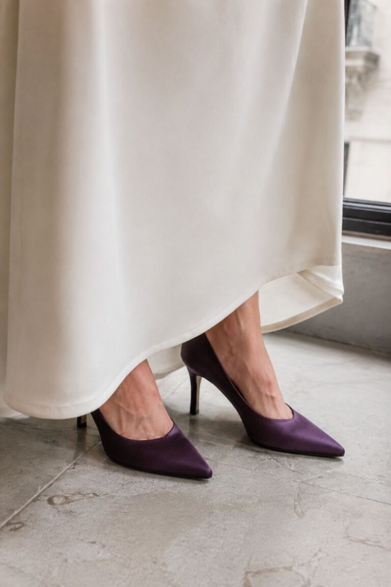 Plum Satin Pumps Under a Clean White Gown