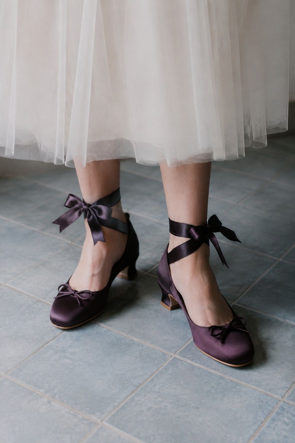 Plum ballet-style heels for a softer bridal look