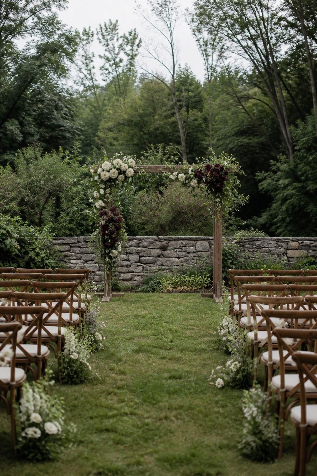 Small ceremony arch with pockets of plum flowers