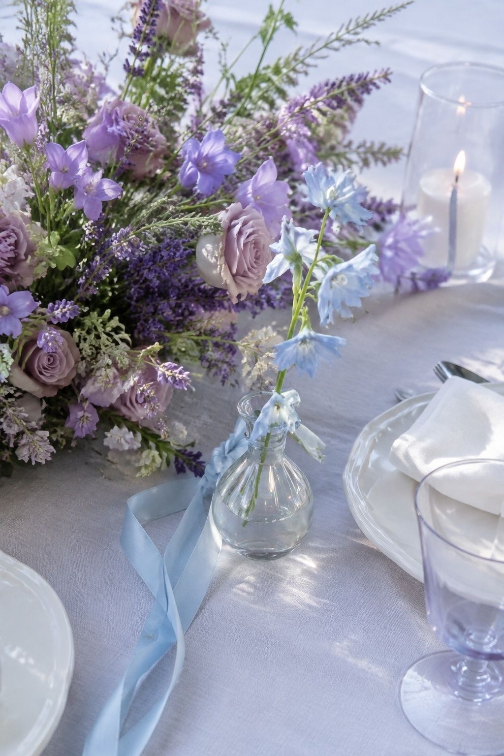 Lavender wedding details with a subtle pale-blue opal-like shift