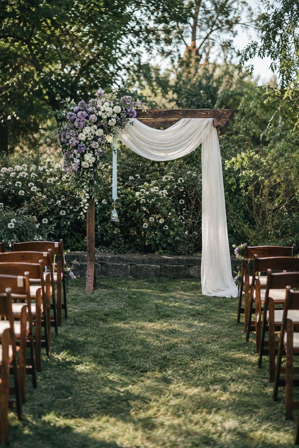 Simple ceremony arch with one restrained purple opal floral accent