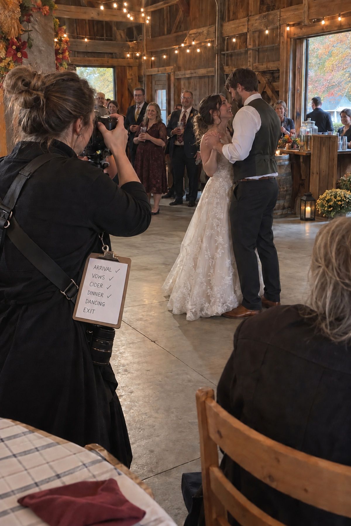 A photographer follows a moment-based list while capturing the first dance at a rustic fall wedding.