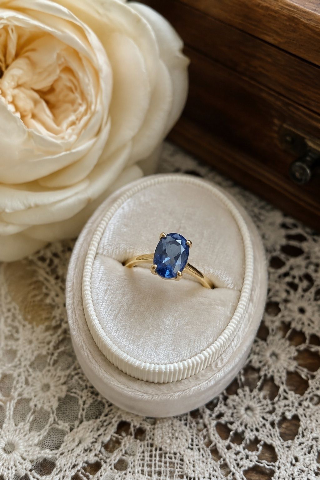 Blue sapphire engagement ring in yellow gold