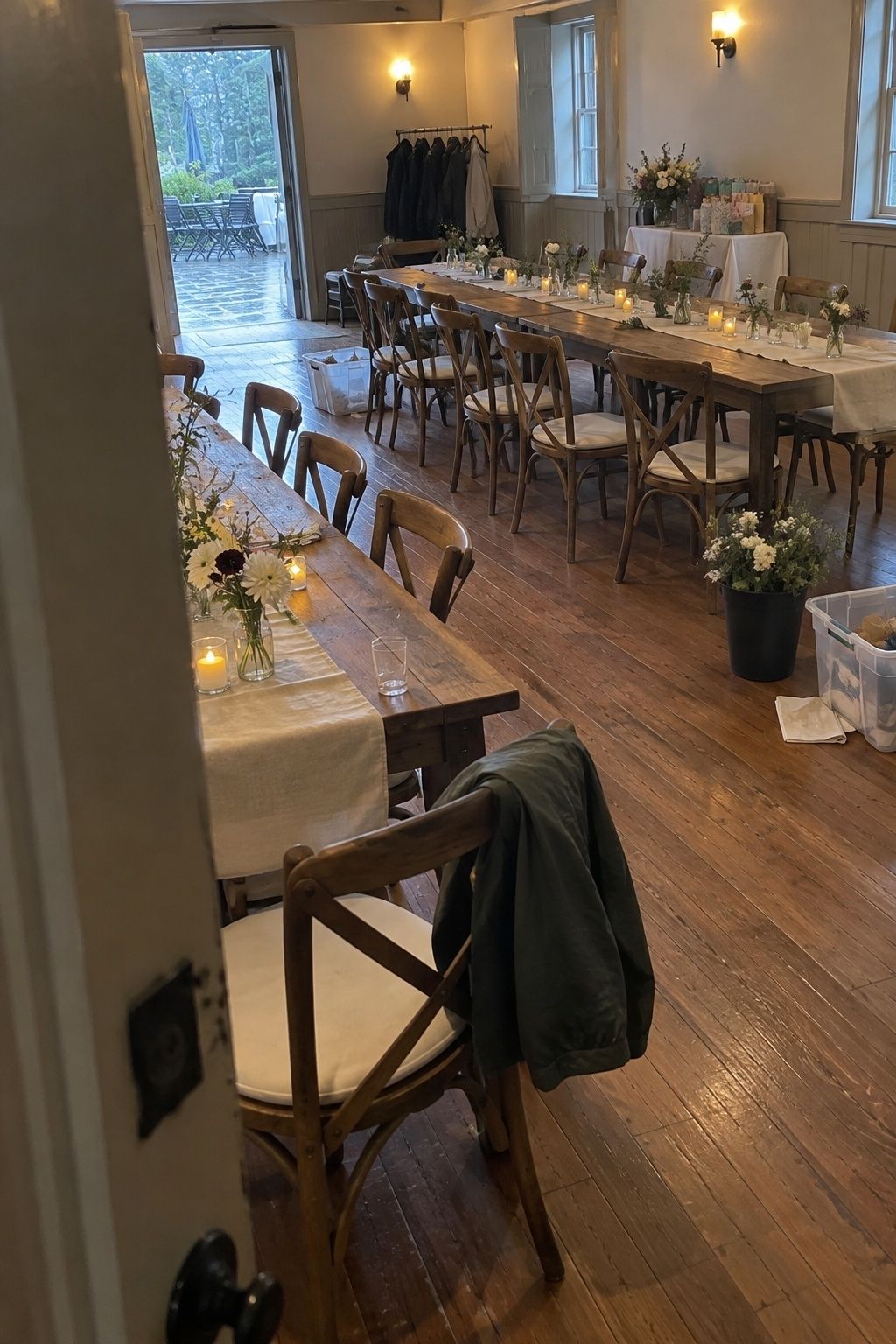 Intimate September wedding backup room with long tables and a clear wide aisle