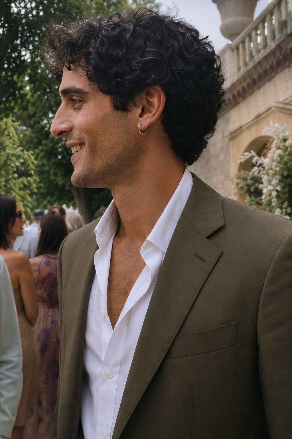 Single silver hoop for a relaxed groom look