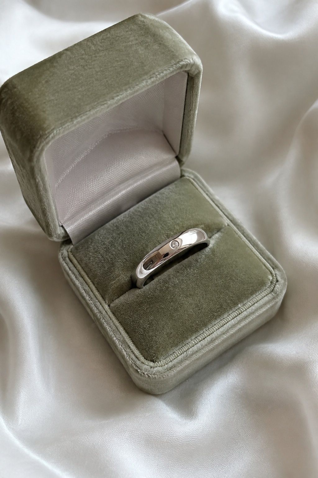 Silver ring with a tiny diamond accent