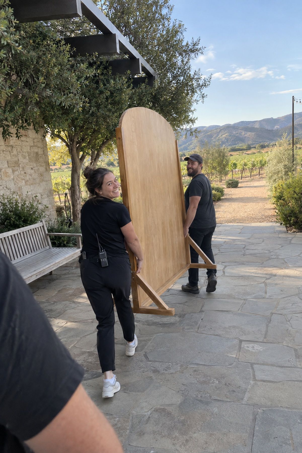 Wedding helpers remove an unnecessary backdrop from a useful shaded guest area.