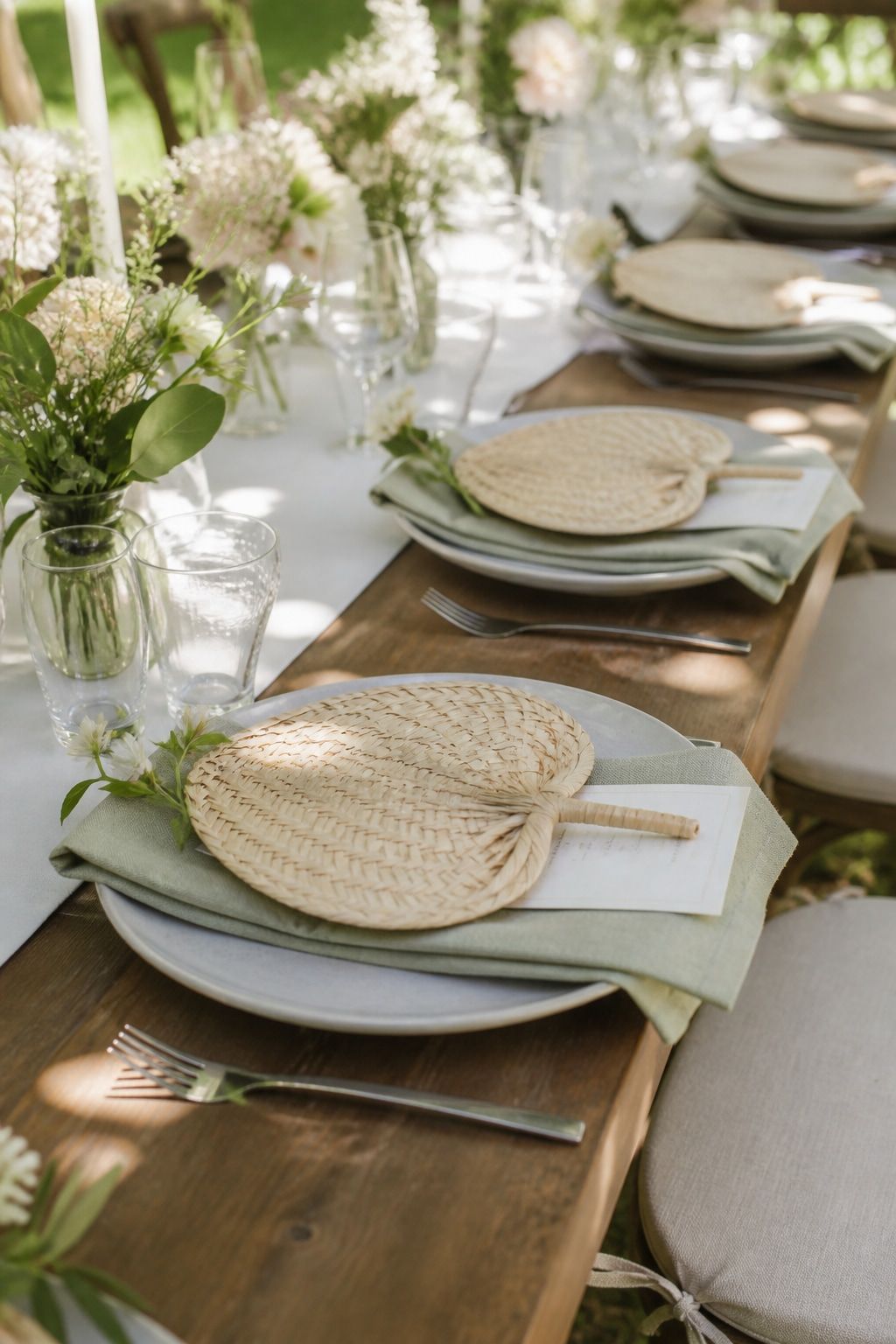 Add Handheld Fans That Match the Place Settings for a small summer wedding