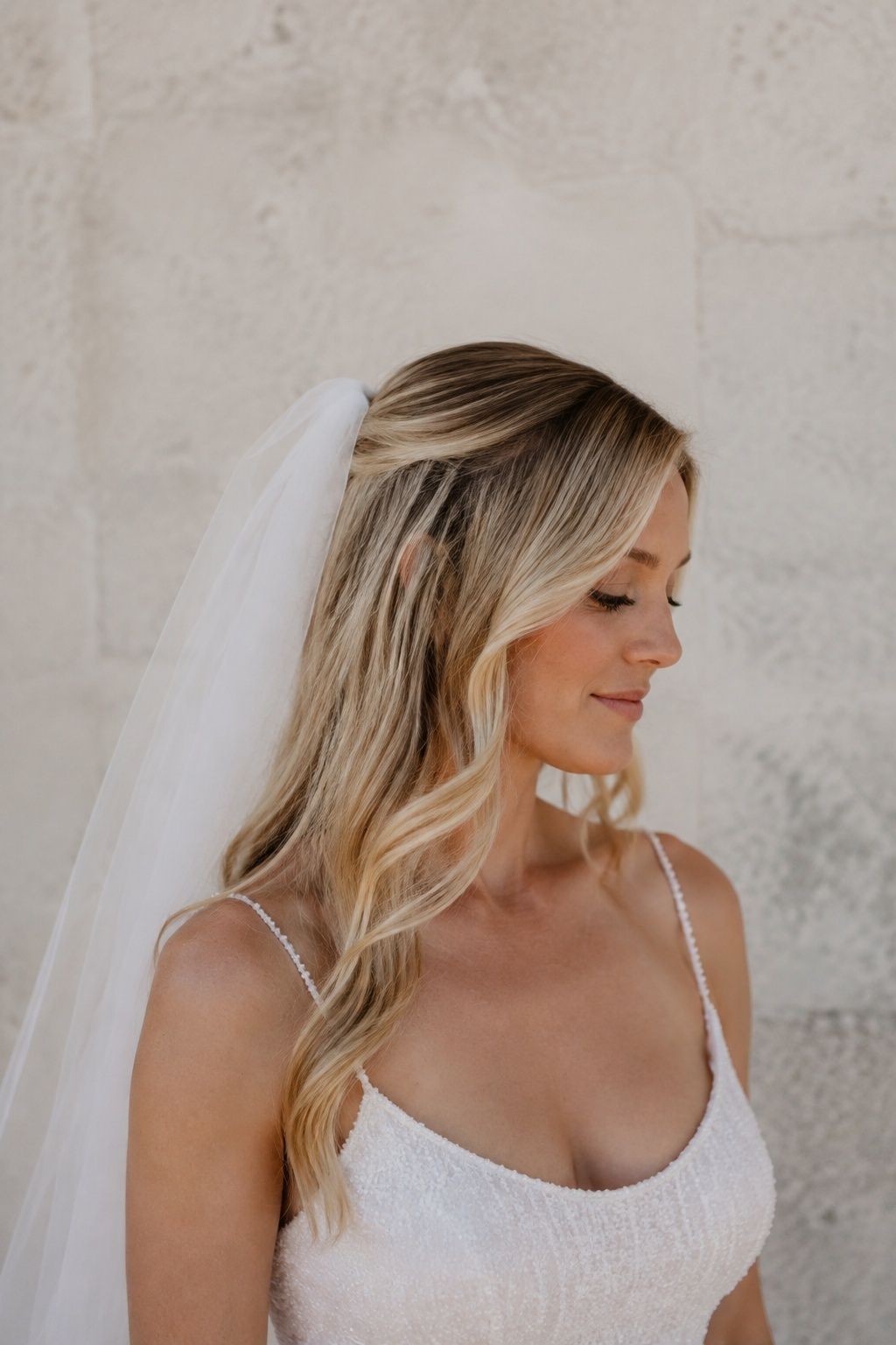 Veil comb worn with a soft side part