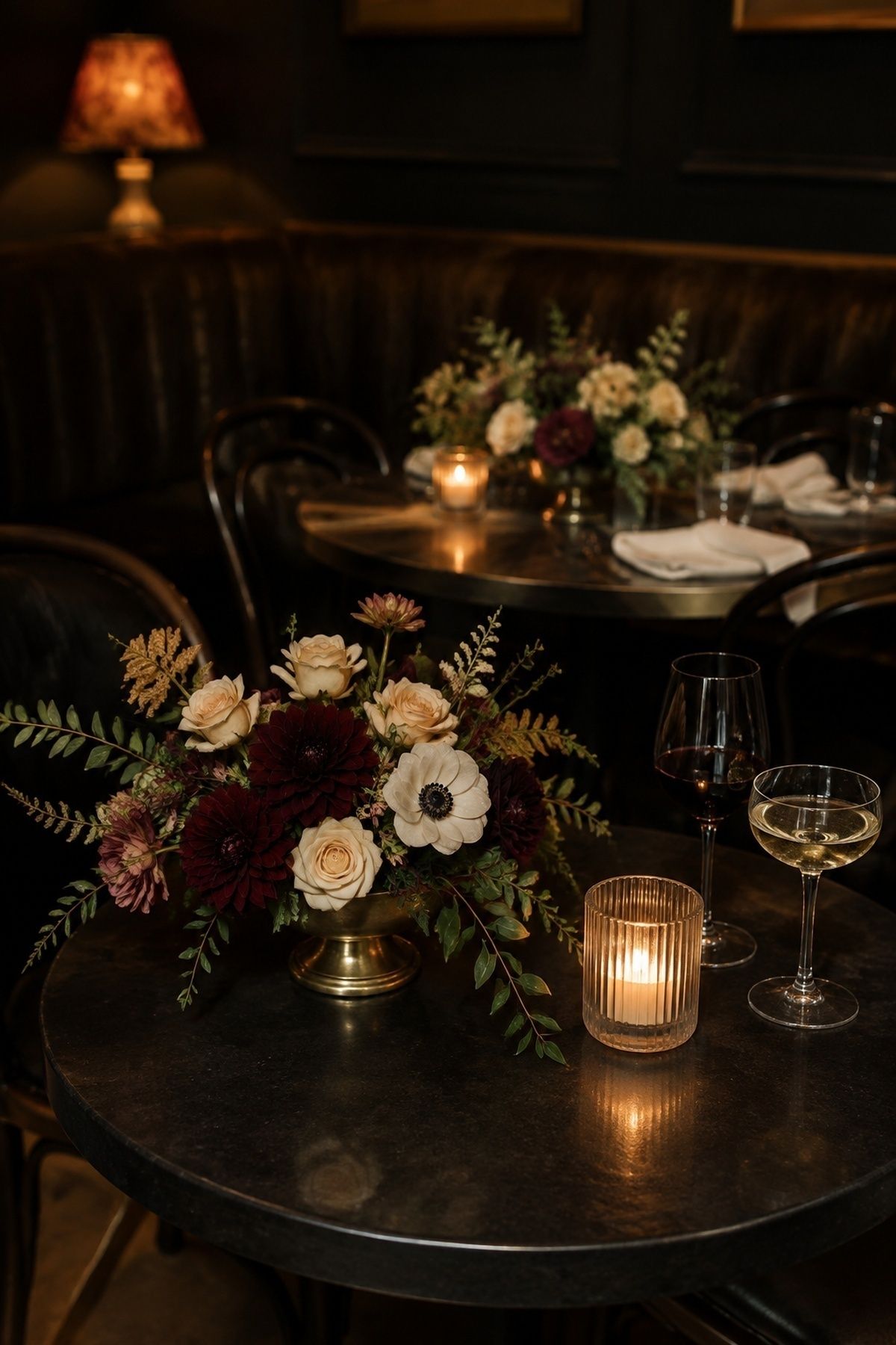 Low moody flowers on small tables