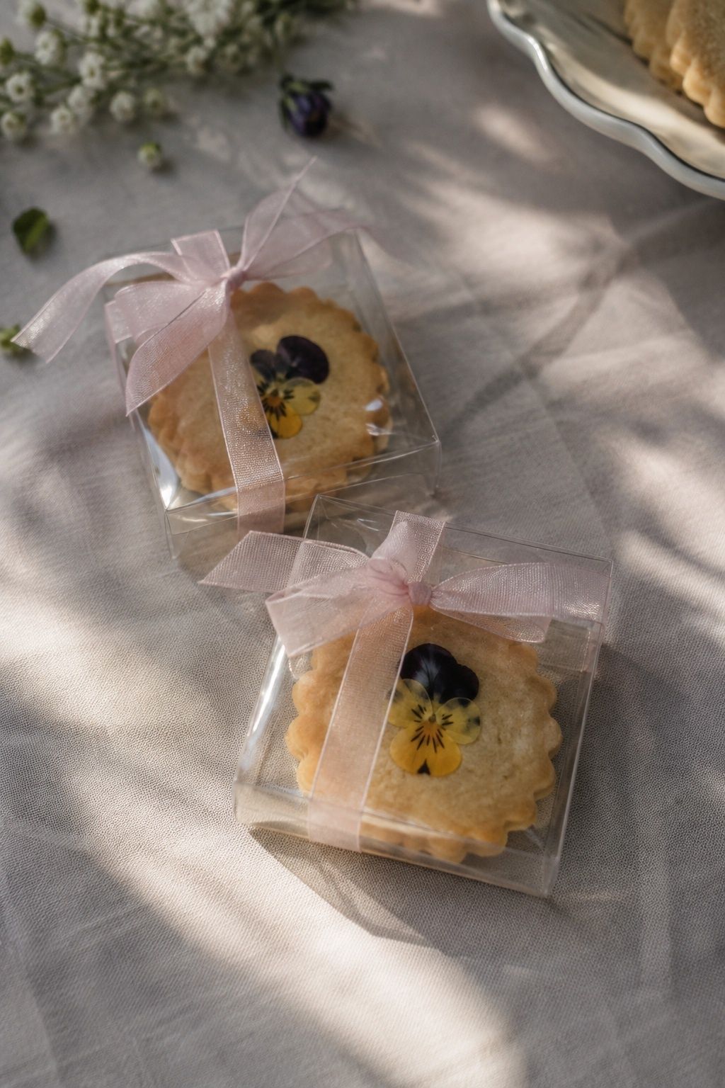 Edible flower cookies in clear boxes