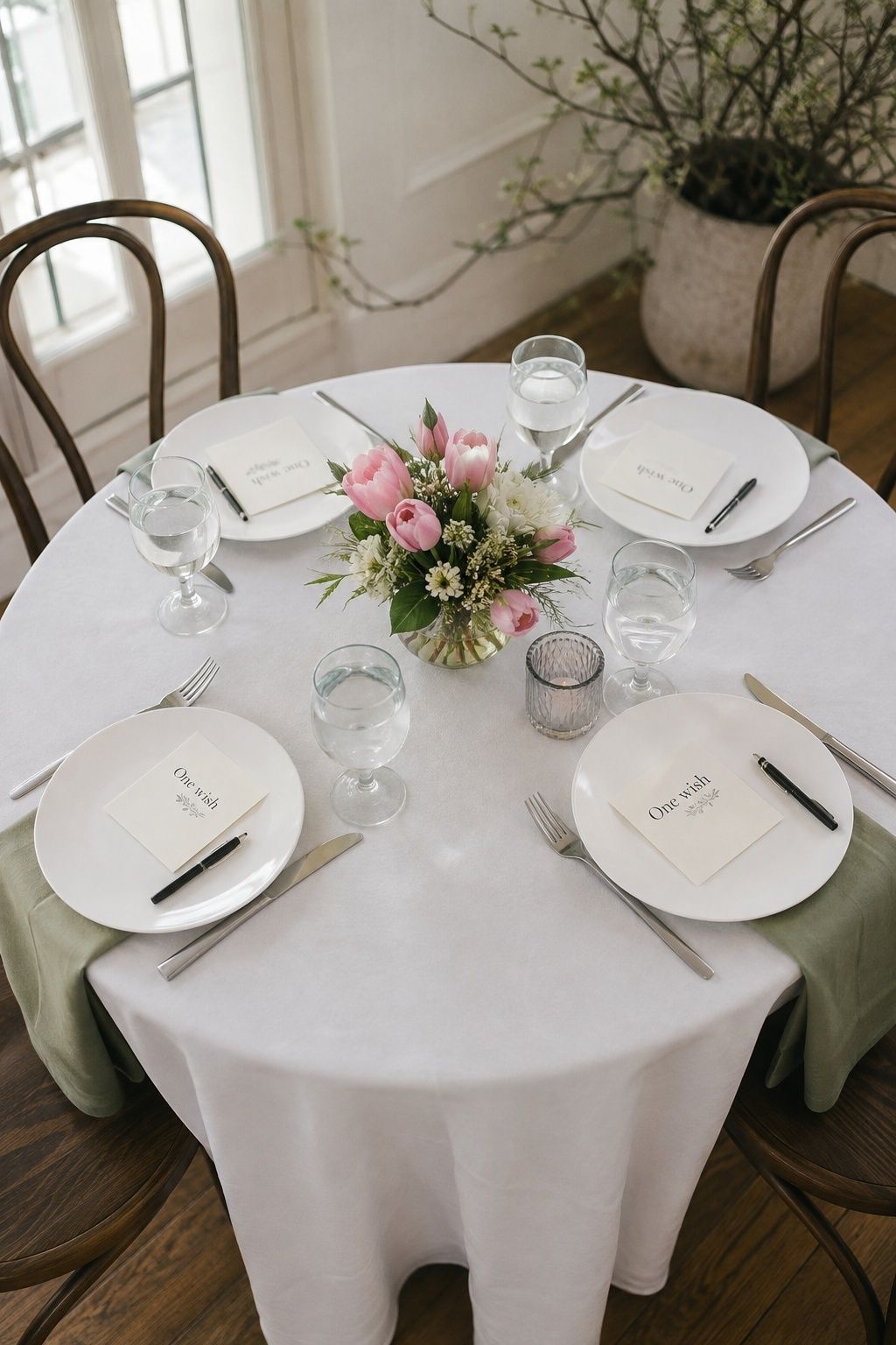 Advice cards and pens at four spring wedding place settings