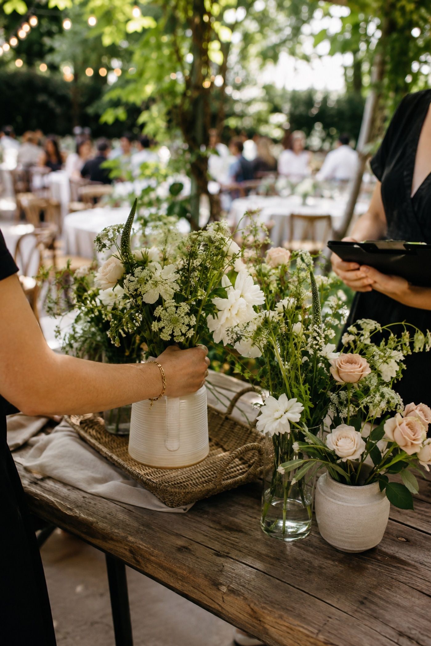 Ceremony flowers reused as reception centerpieces