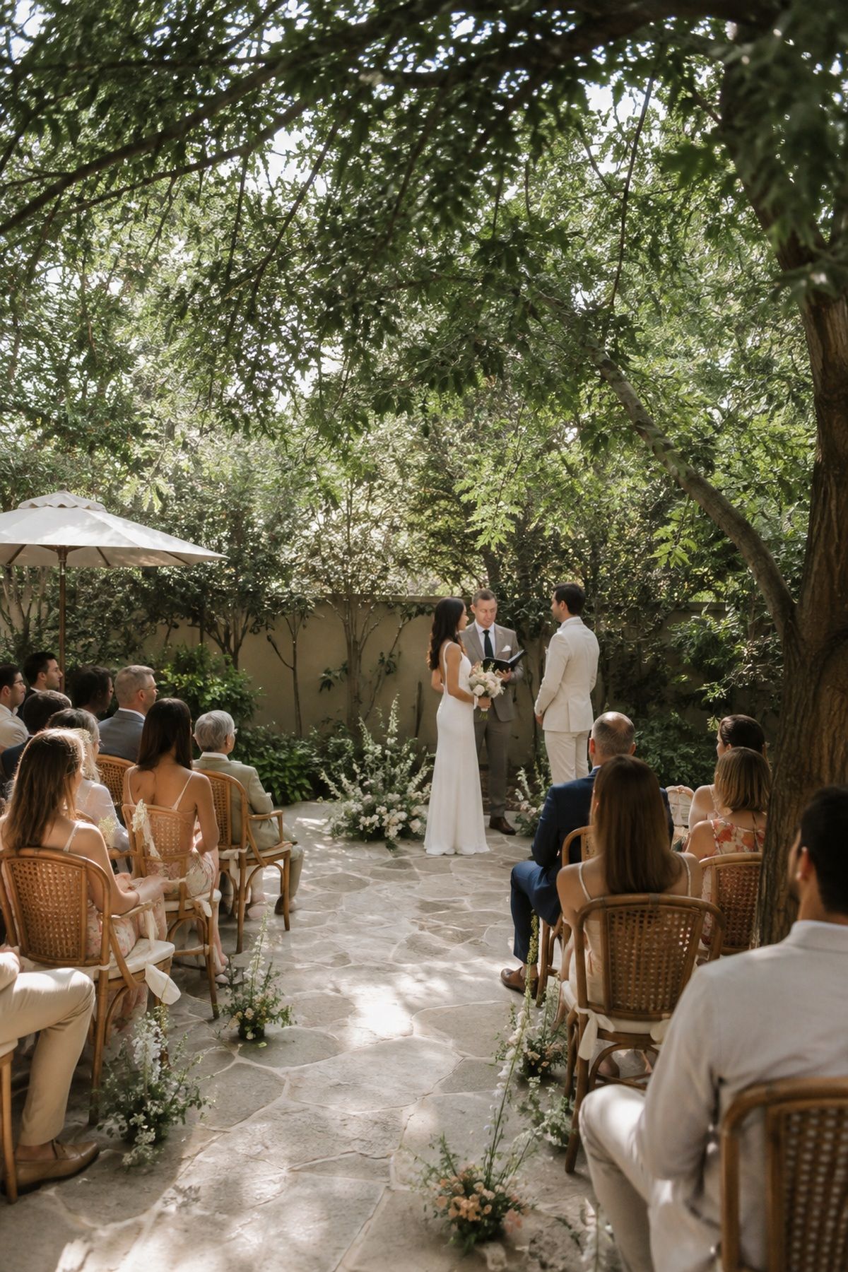 Outdoor summer wedding ceremony flow with shaded close seating, clear aisle space, and low florals