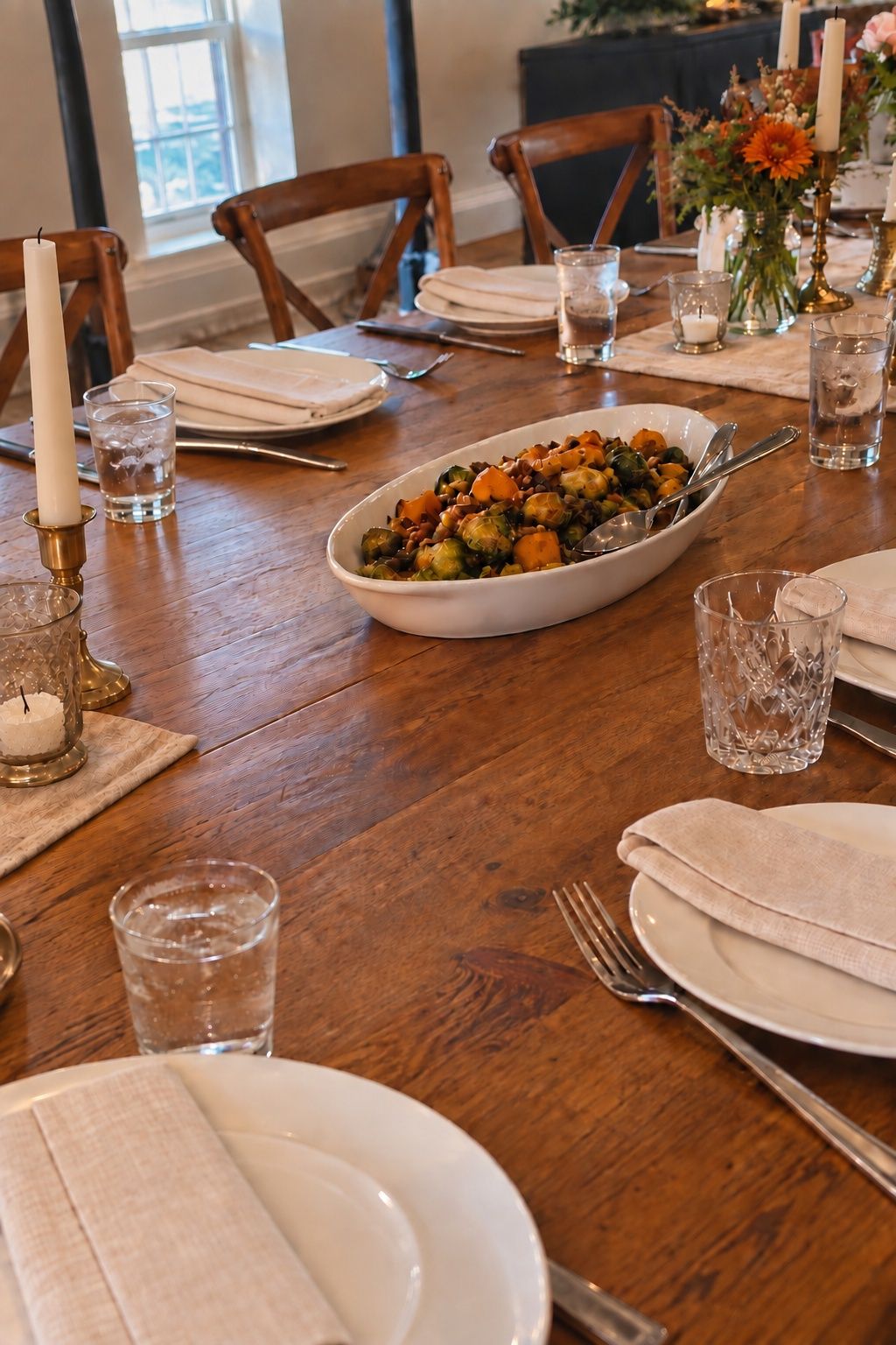 Family-style platters on a Thanksgiving wedding table