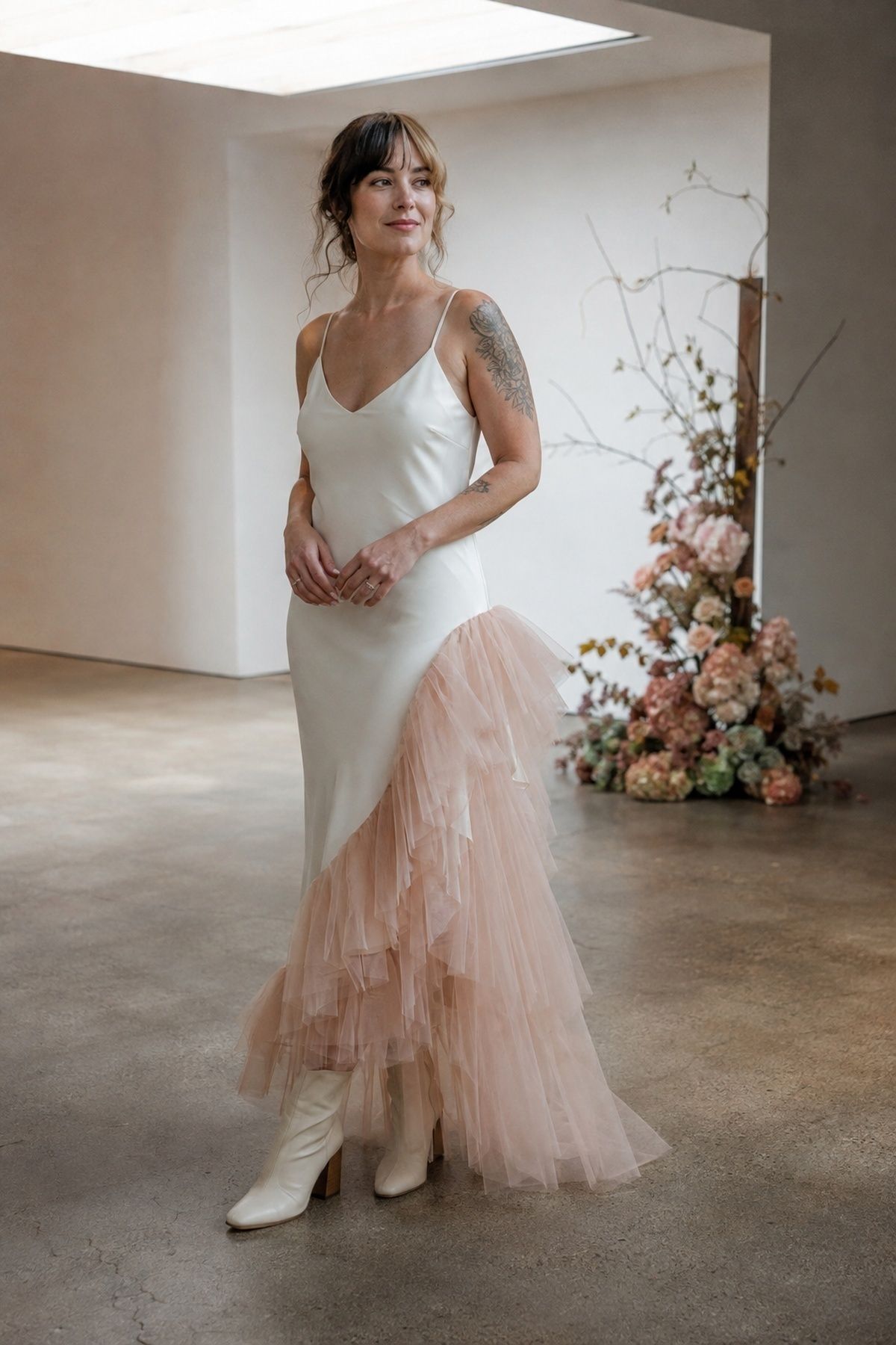 Dramatic tulle layer for an alternative bridal silhouette