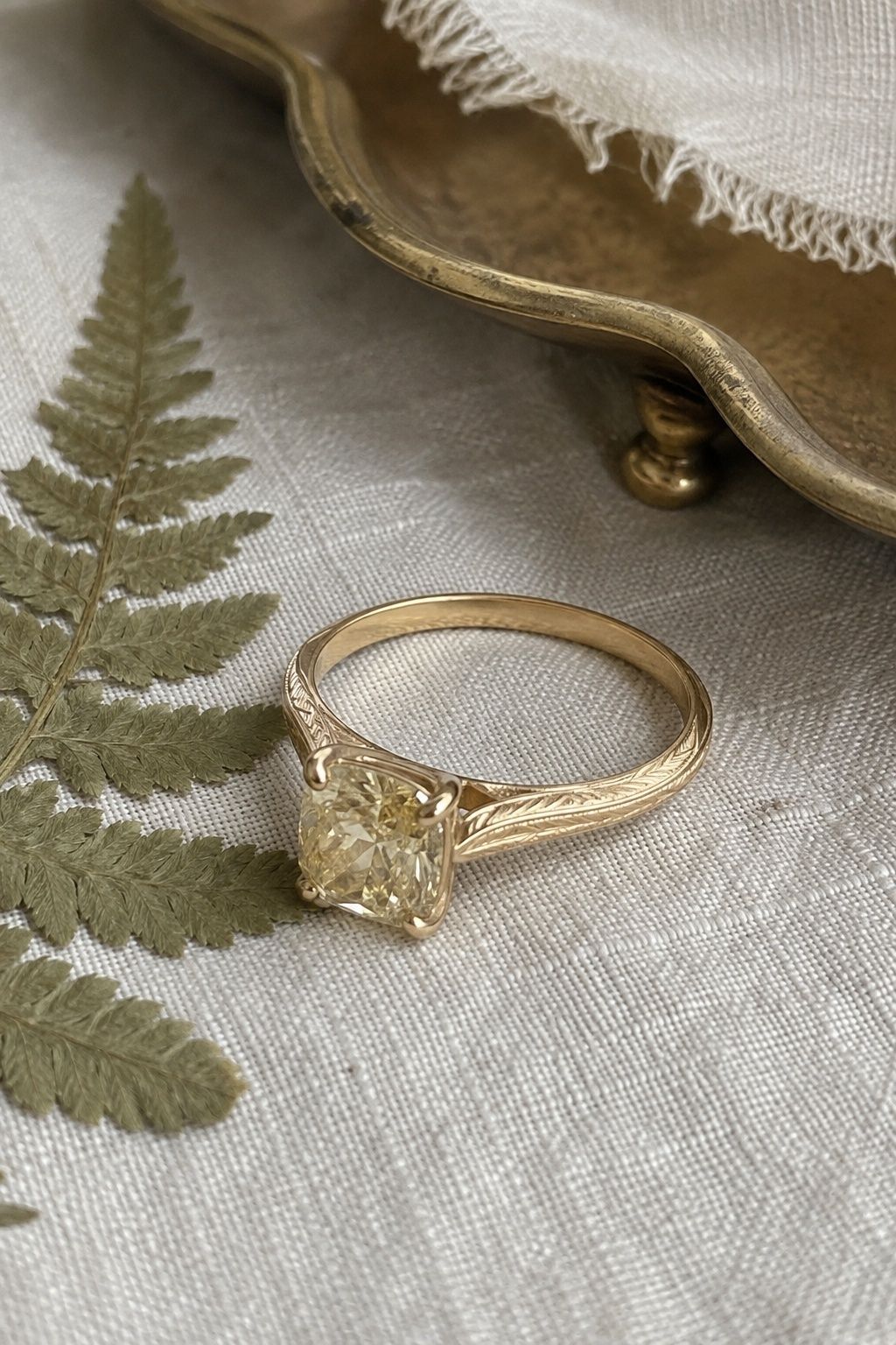 Yellow gold cushion ring with hand engraving