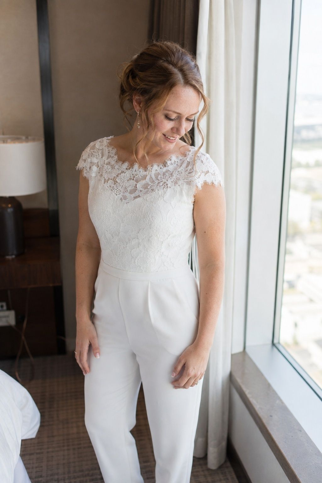 White bridal jumpsuit with a lace bodice